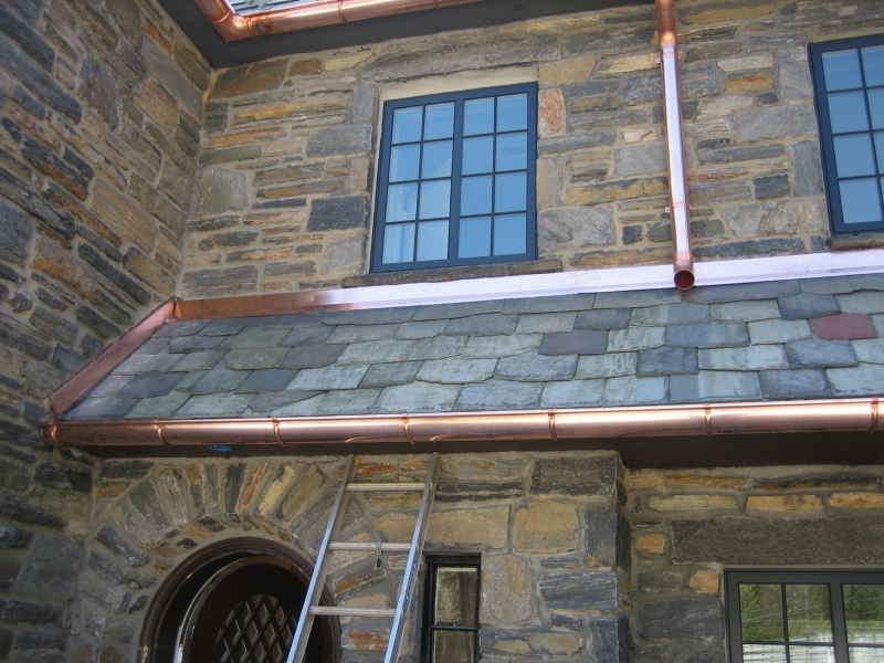 European Style Copper Gutters on Stone House Hurnik Construction